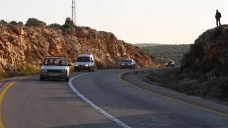 "אבטחנו את הכביש". אילוסרציה (אהוד אמיתון סוכנות תצפית)