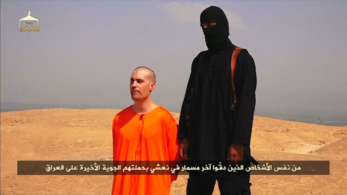 סרטון ההוצאה להורג של העיתונאי האמריקאי ג'יימס פולי בידי דאעש (צילום מסך)