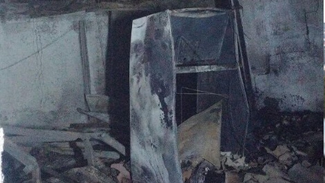 מספר בתים ולולים נשרפו כליל בשריפה שהוצתה כלל הנראה בידי ערבים. אחד הבתים שנפגע (אור אריגאס, סוכנות תצפית)